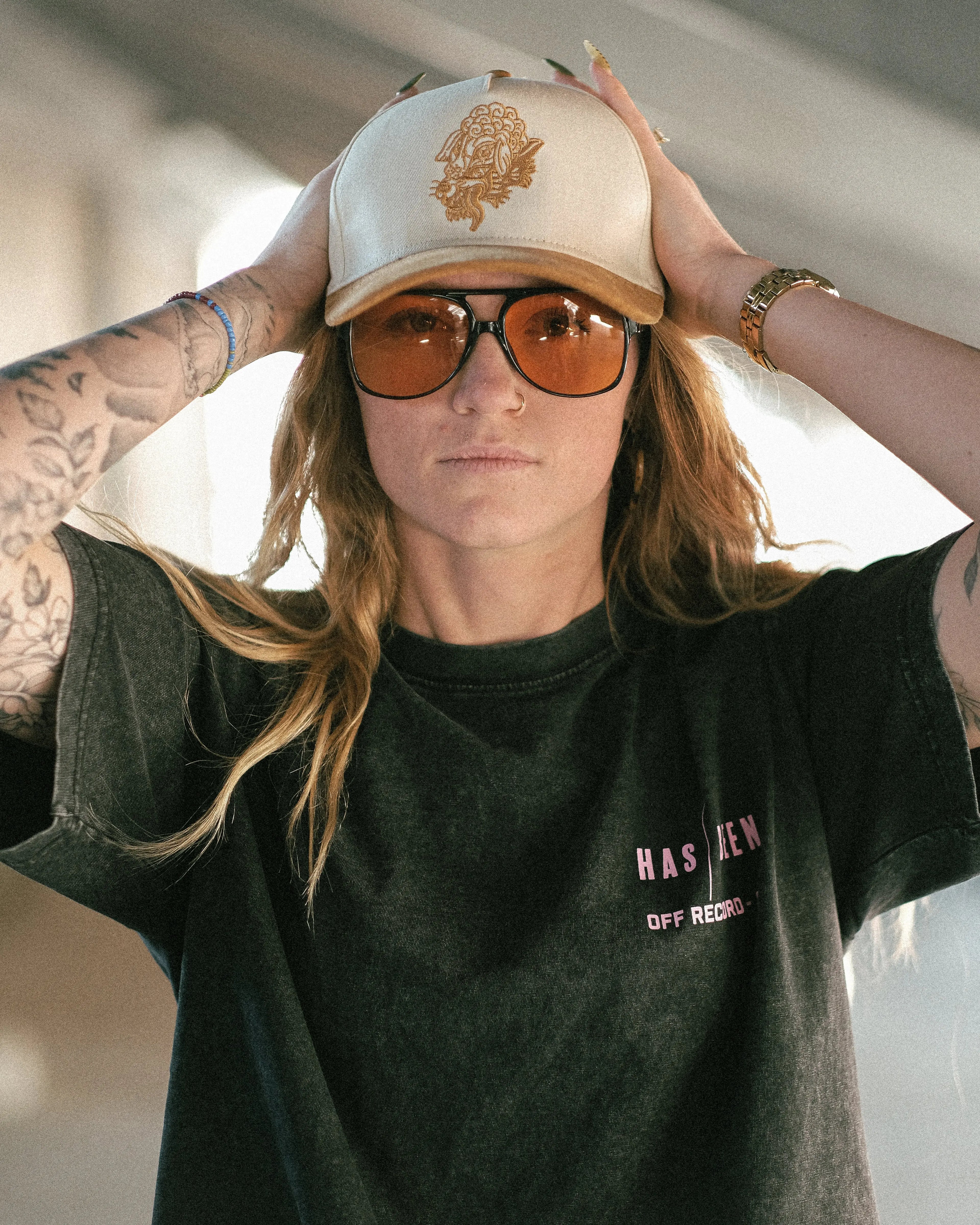 HAS/BEEN off record 5 panel cap ivory crown tan suede brim on model front view embroidered logo